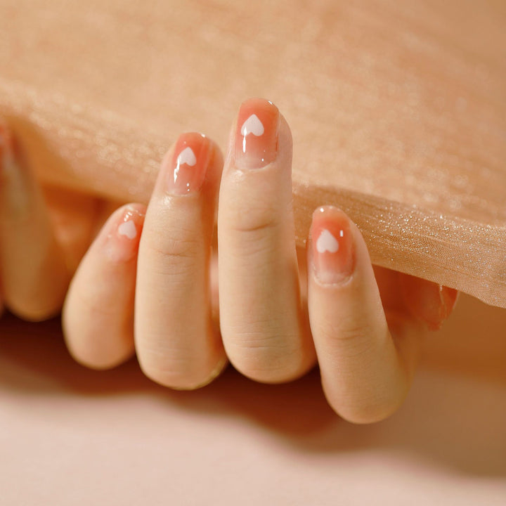 Artificial nail design with heart motif Kalsten