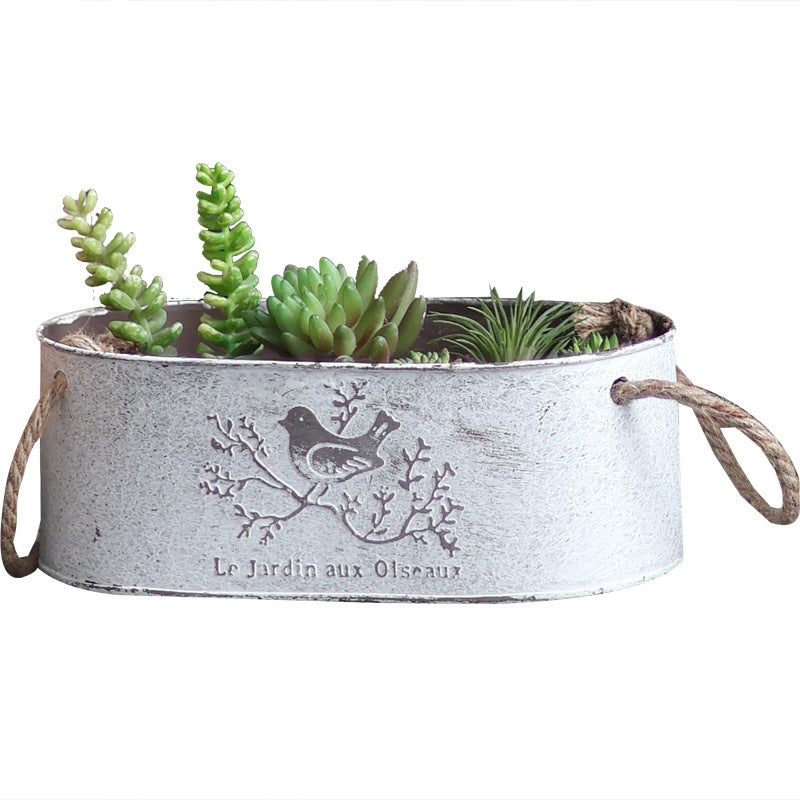 Decorative storage basket made of metal with natural design Kalsten