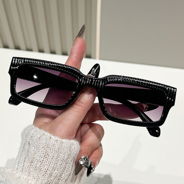 Ladies stylish sunglasses with textured frame Kalsten