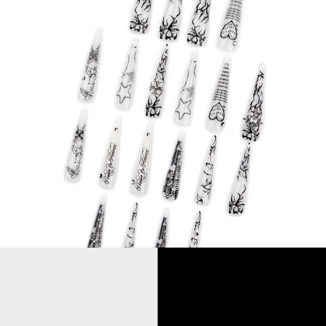 Artful stiletto nails with gothic pattern and embellishments Kalsten