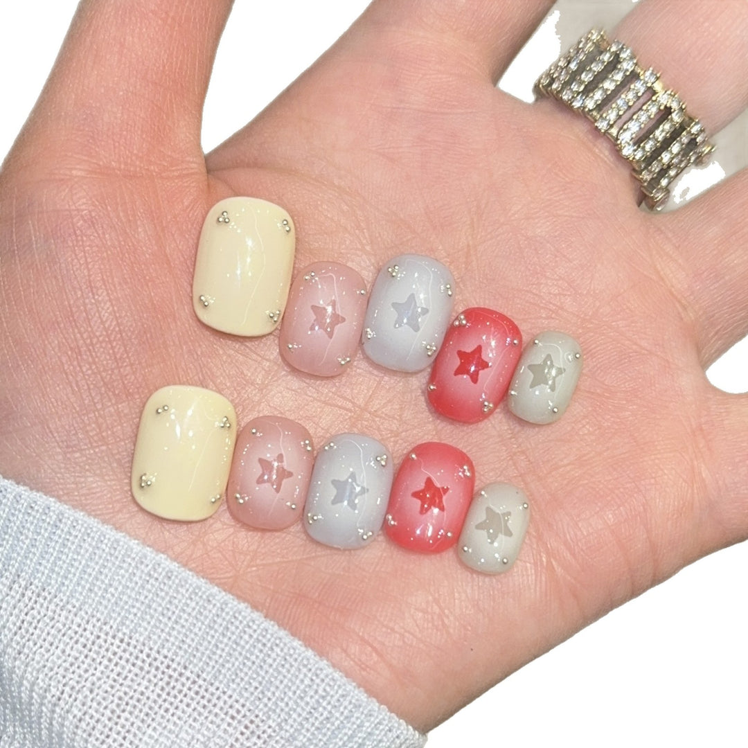 Artificial nails with sparkling star motifs Kalsten