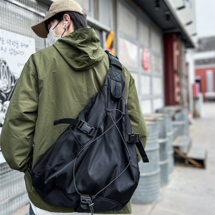 Sporty sling backpack with adjustable straps and practical organizer Kalsten