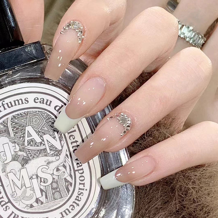 Artful stiletto nails with rhinestone accents Kalsten