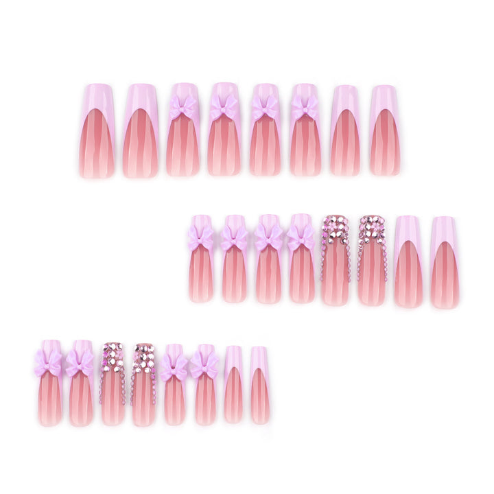 Artful Nail Art with Rhinestone Accents and Bows Kalsten
