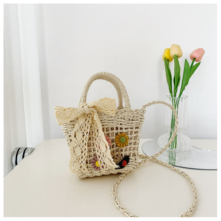Playful basket bag with floral accents Kalsten