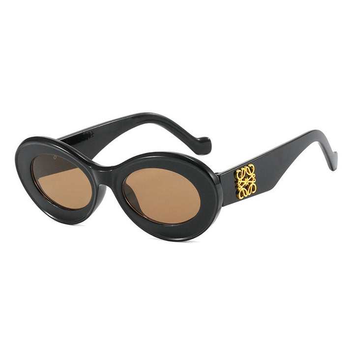 Women's fashionable sunglasses with oval frame and golden accents Kalsten