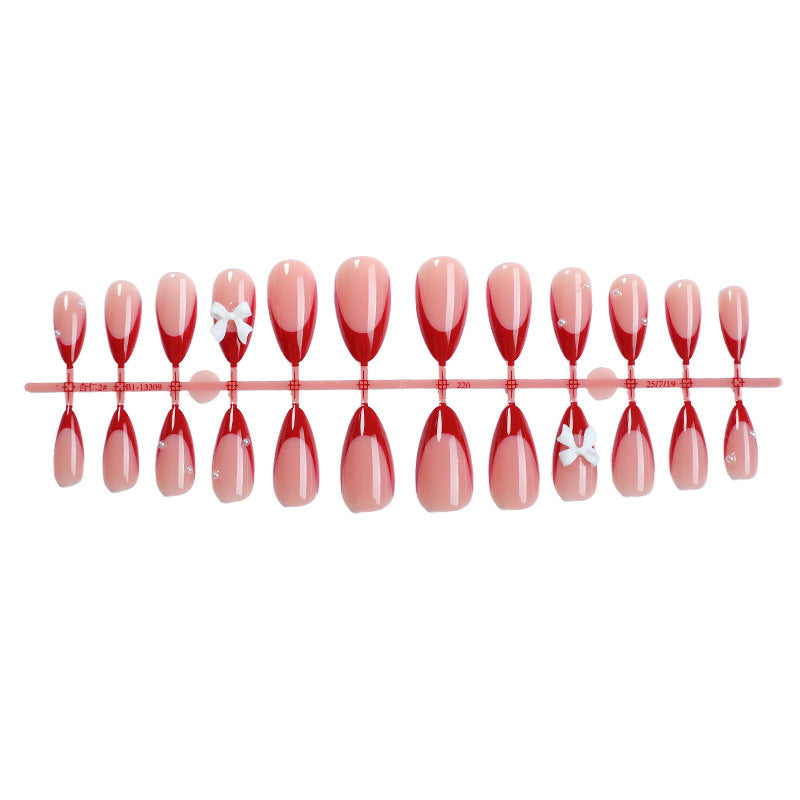 Artificial nail set with elegant bows and glitter accents Kalsten