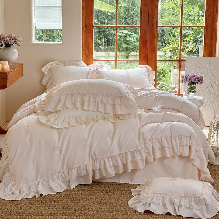 Romantic cotton bedding set with ruffles and delicate floral embroidery