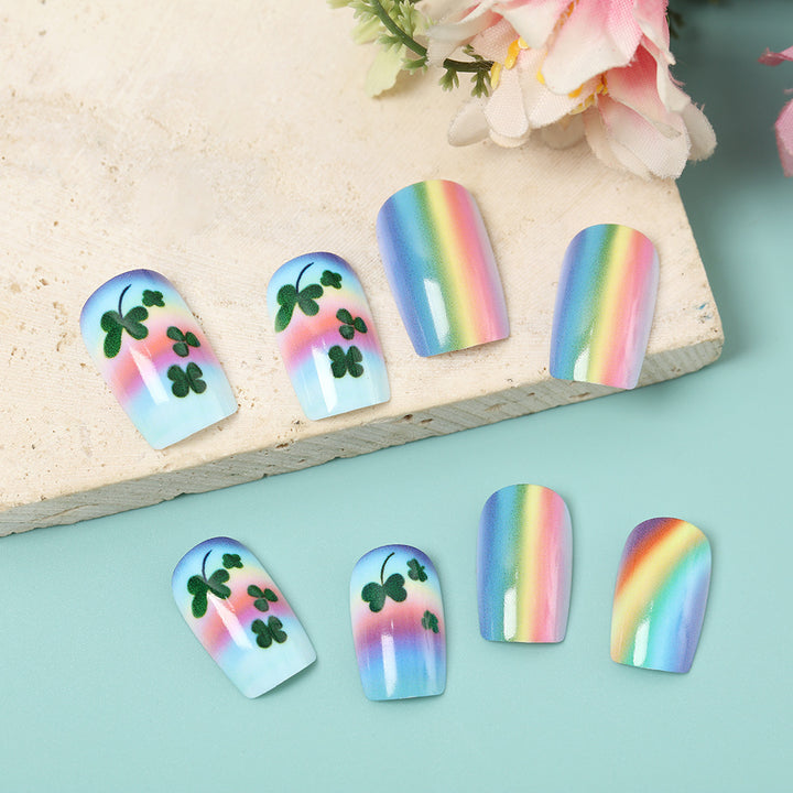 Artificial nails with colorful rainbow and clover leaf designs Kalsten
