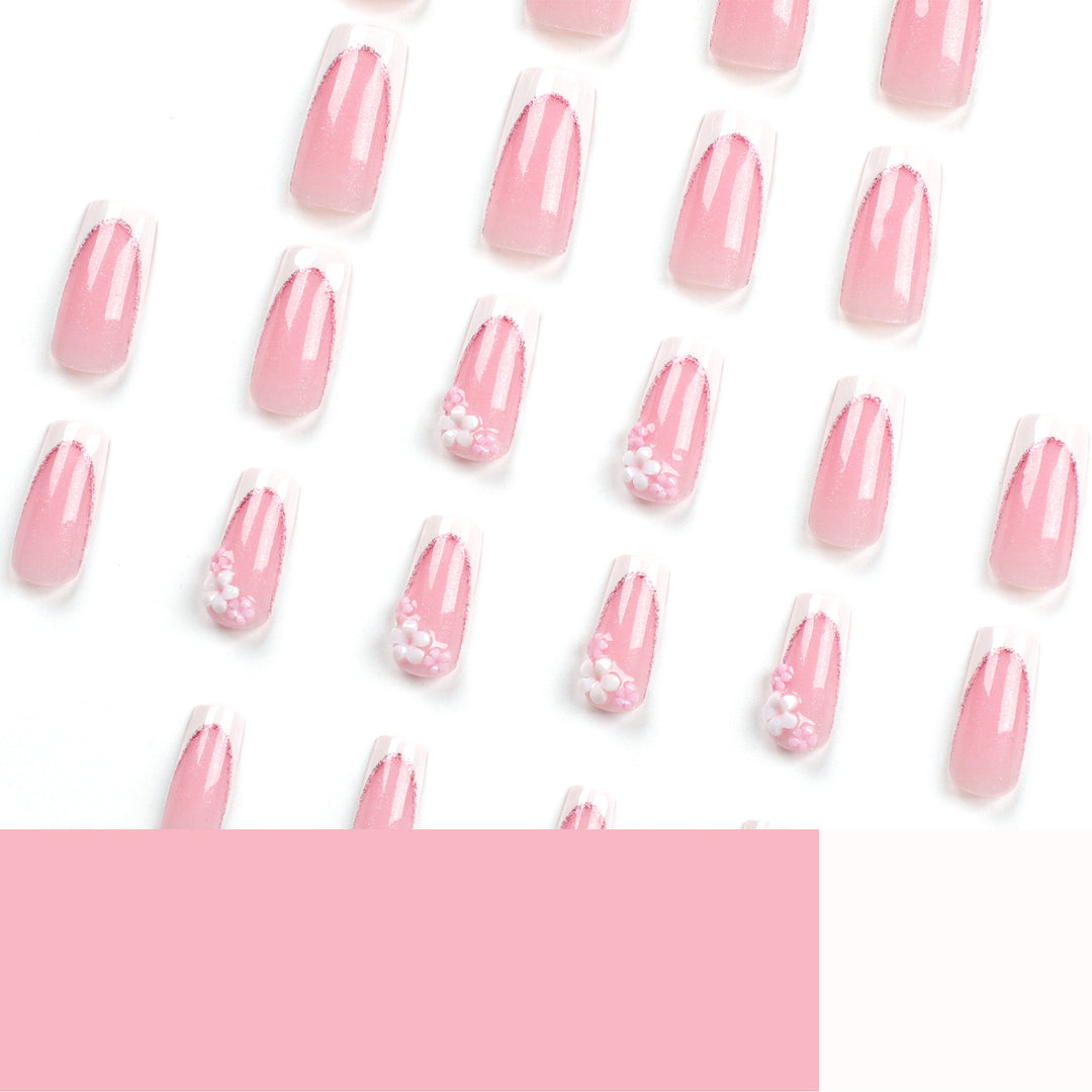 Artful Nail Extensions with Glitter and Flower Accents Kalsten