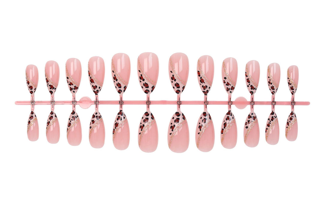 Acrylic nail set with glamorous animal print and elegant accents Kalsten
