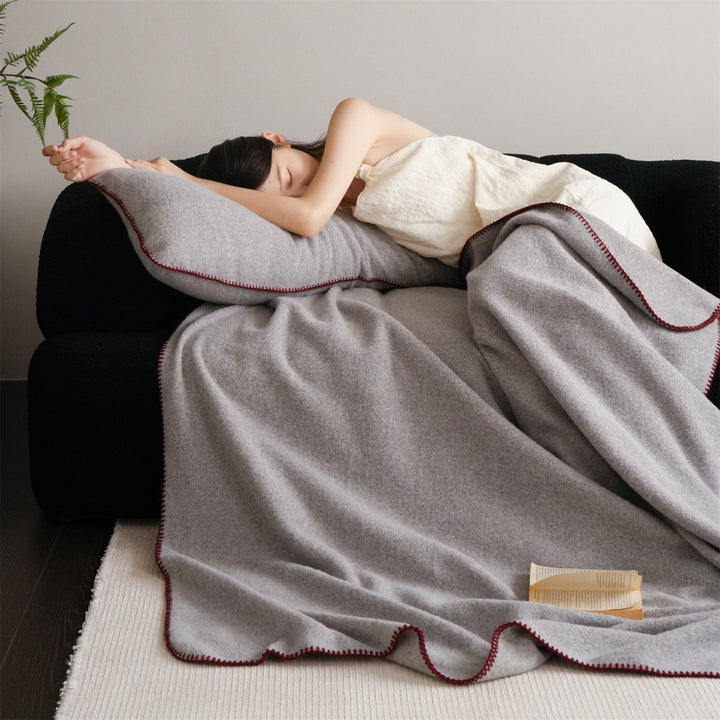 Premium wool blanket with fine hand-stitched edge and particularly soft drape