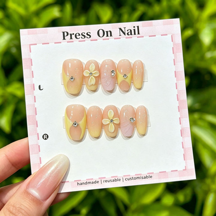 Artistic Press-On Nail Art Set with Cute Character and Bow Accents
