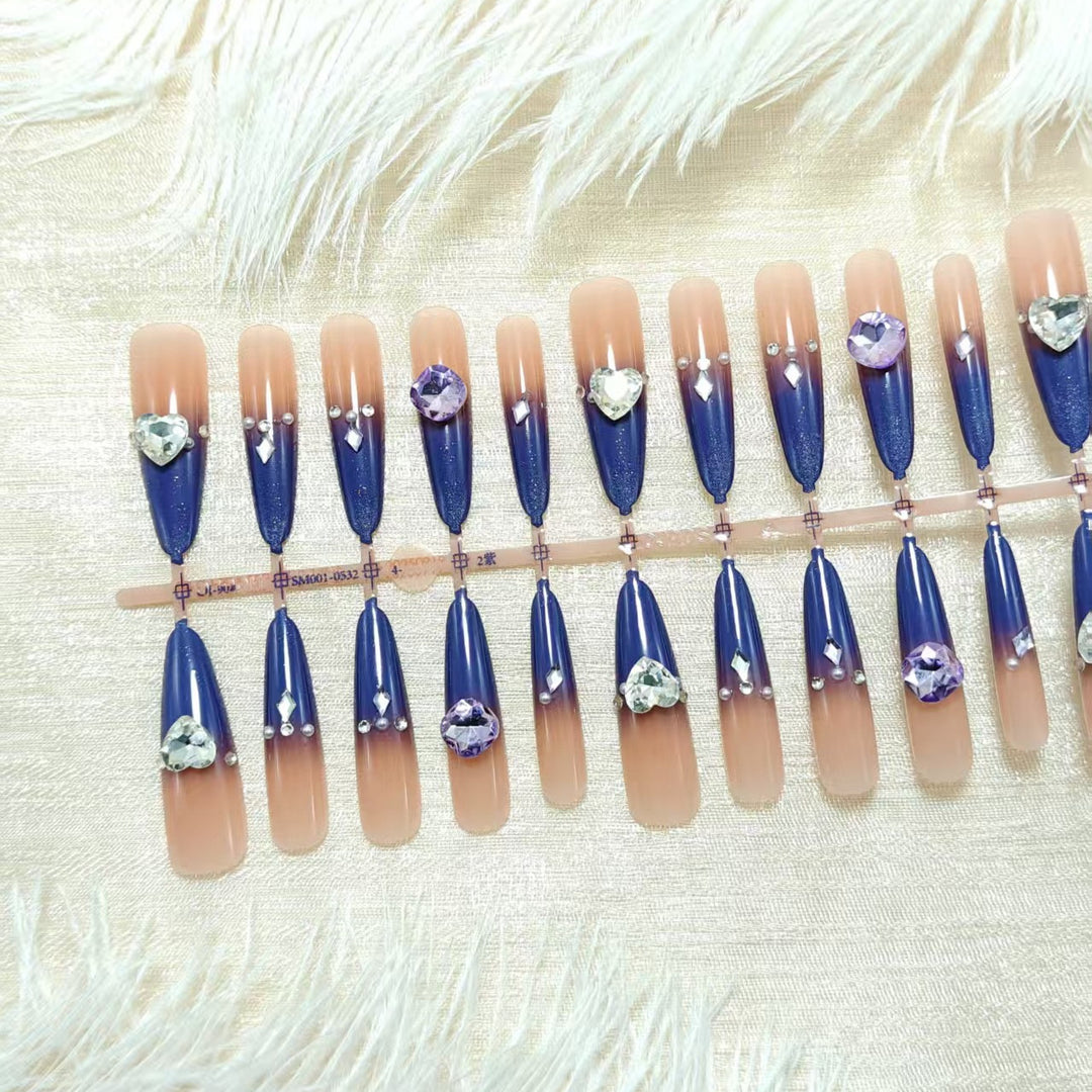 Artificial nails with elegant glitter design and 3D rhinestone accents Kalsten