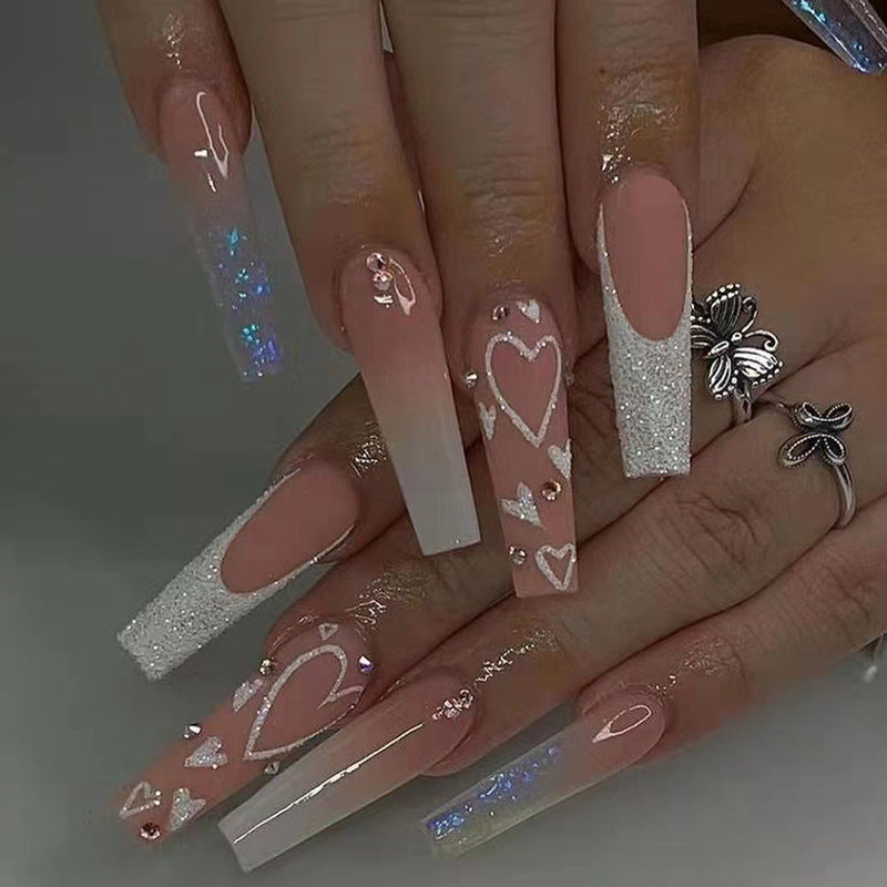 Elegant artificial nail tips with heart and glitter pattern Kalsten