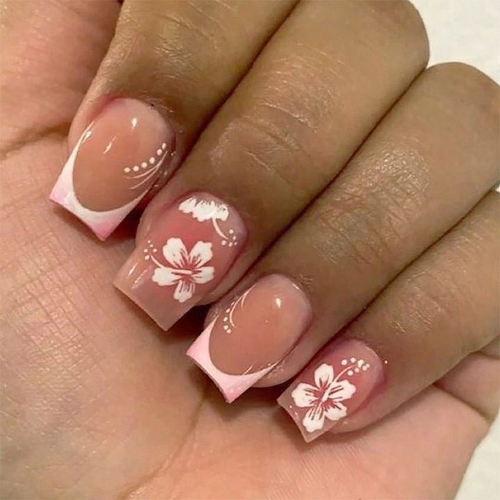 Acrylic nail set with elegant flower and French tip designs Kalsten