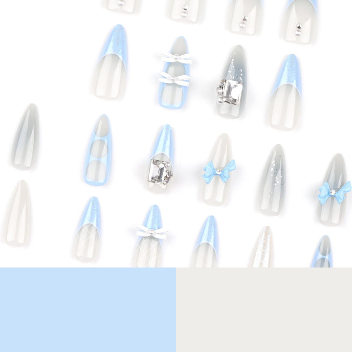 Artistic stiletto nails with elegant jewelry accents Kalsten