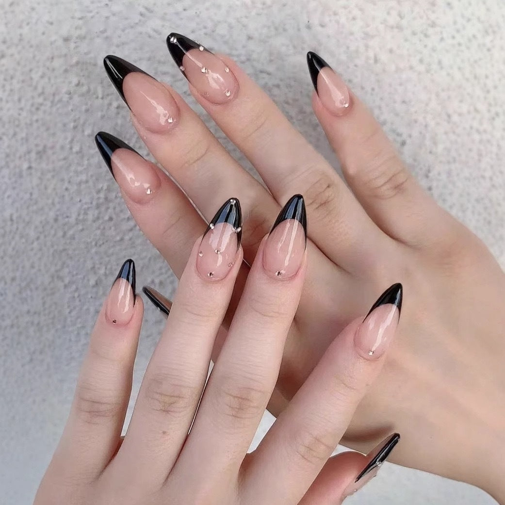 Artificial nail tips with elegant French design and glamorous details Kalsten
