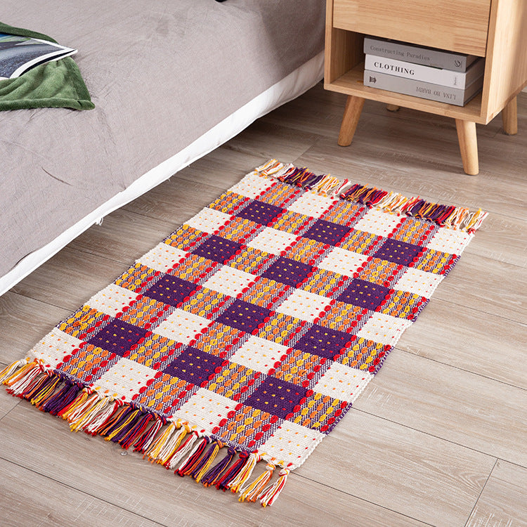 Striped cotton doormat with non-slip bottom and decorative woven edge Kalsten