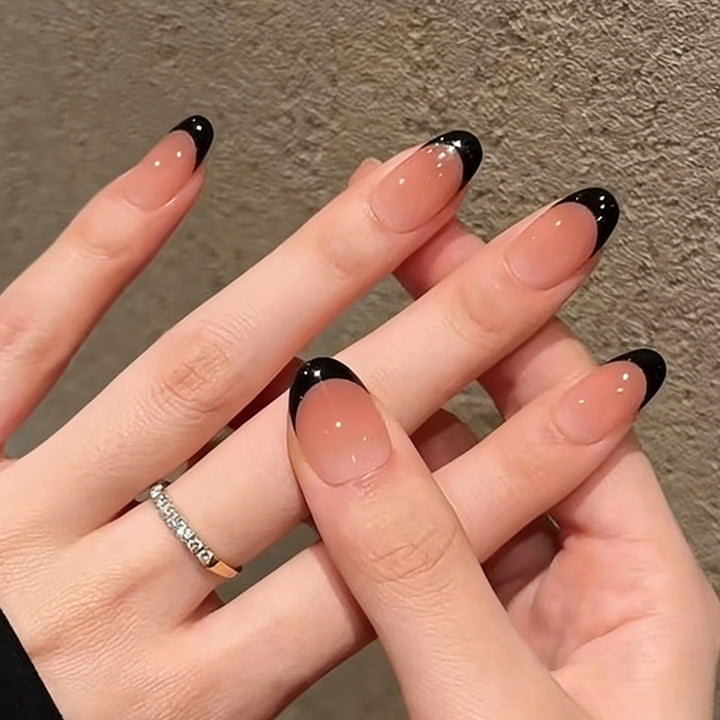 Acrylic nail set with elegant French tip and shimmering accents Kalsten