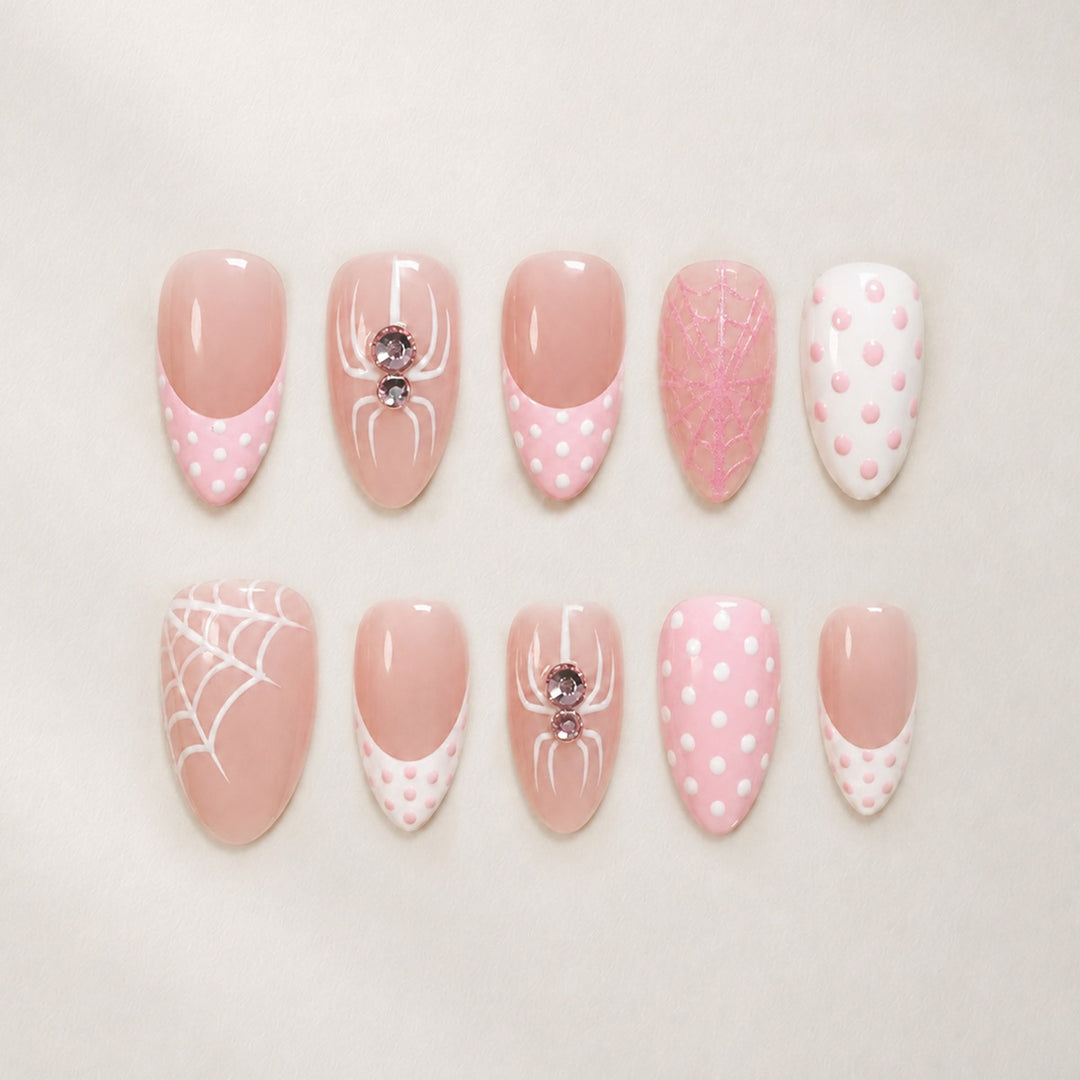 Artificial nail set with playful spider and polka dot motifs Kalsten
