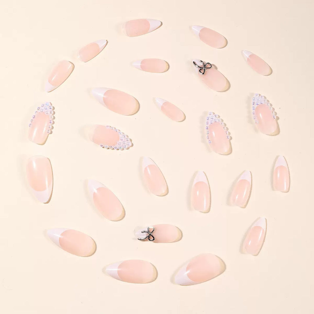 Acrylic nail set with elegant pearl and bow decorations Kalsten