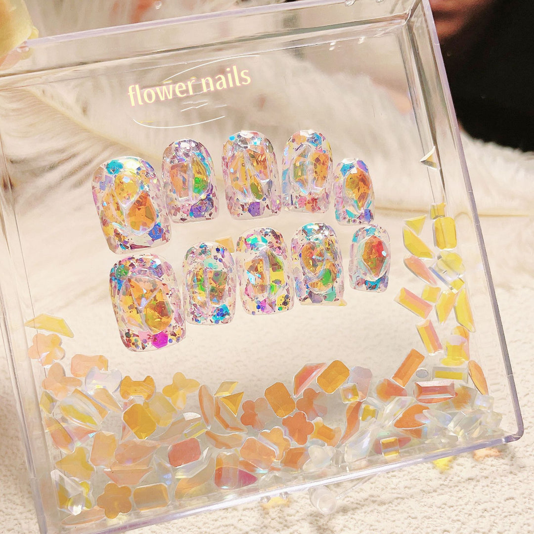 Artful nail tips with glitter accents Kalsten