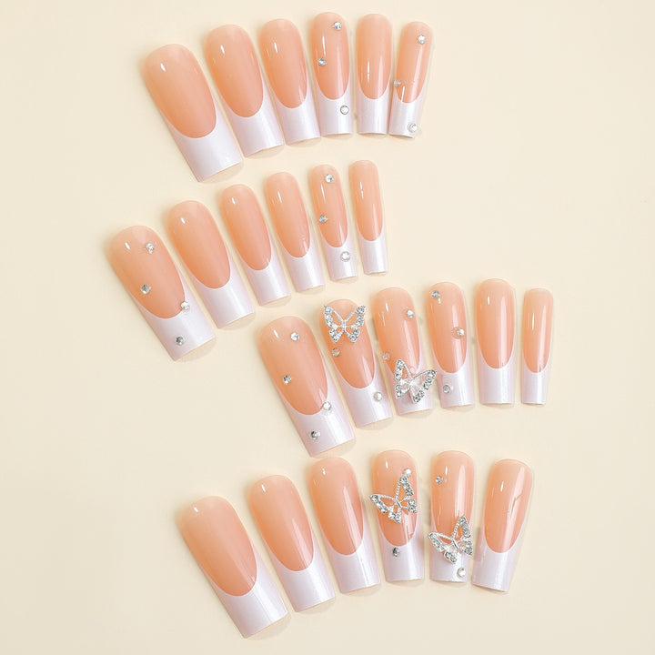 Artificial nail set with luxurious glitter and delicate floral designs Kalsten