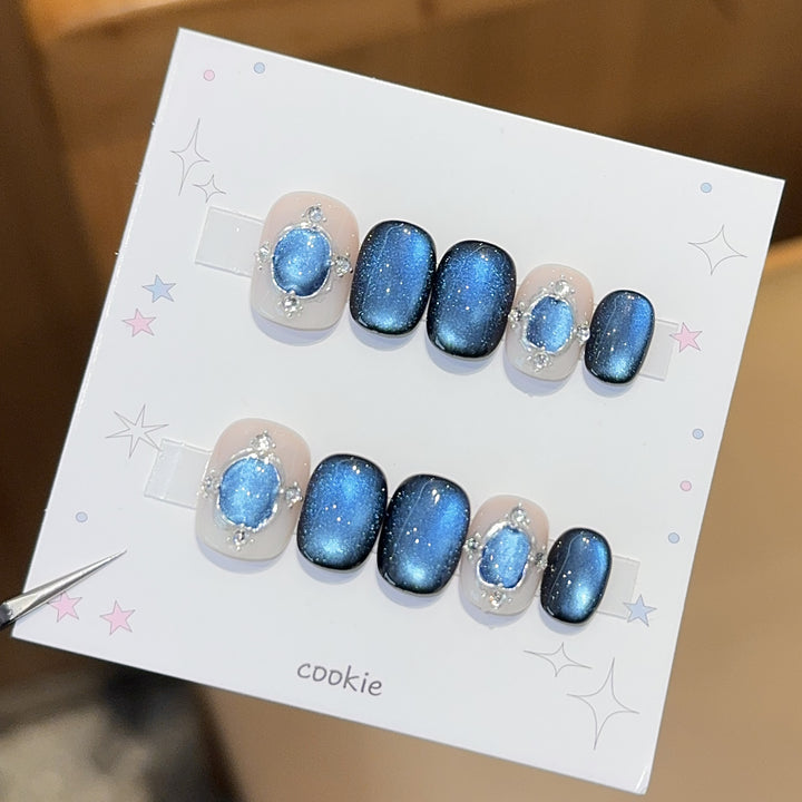Glamorous artificial nails with shimmering star effect Kalsten