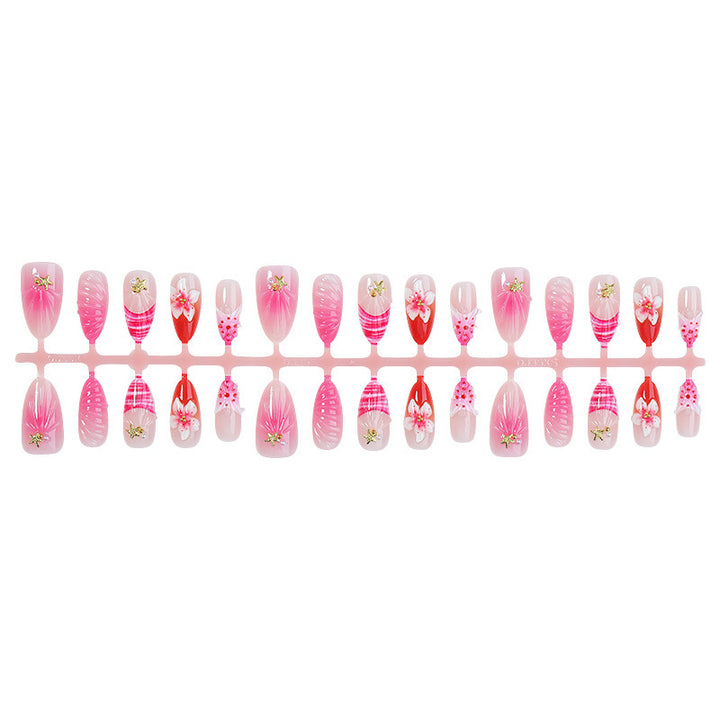 Acrylic nail set with luxurious glitter and flower accents Kalsten