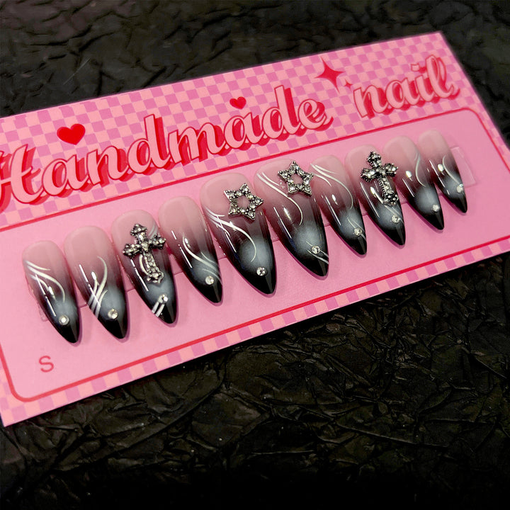 Artistic stiletto nails with elegant glitter design Kalsten