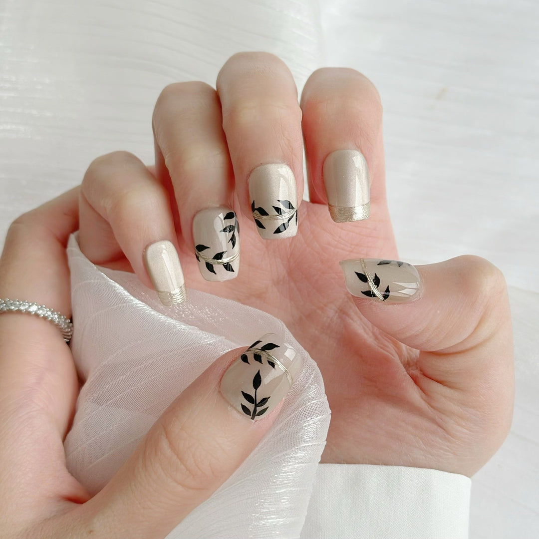 Artistic Press-On Nail Set with Floral Accents