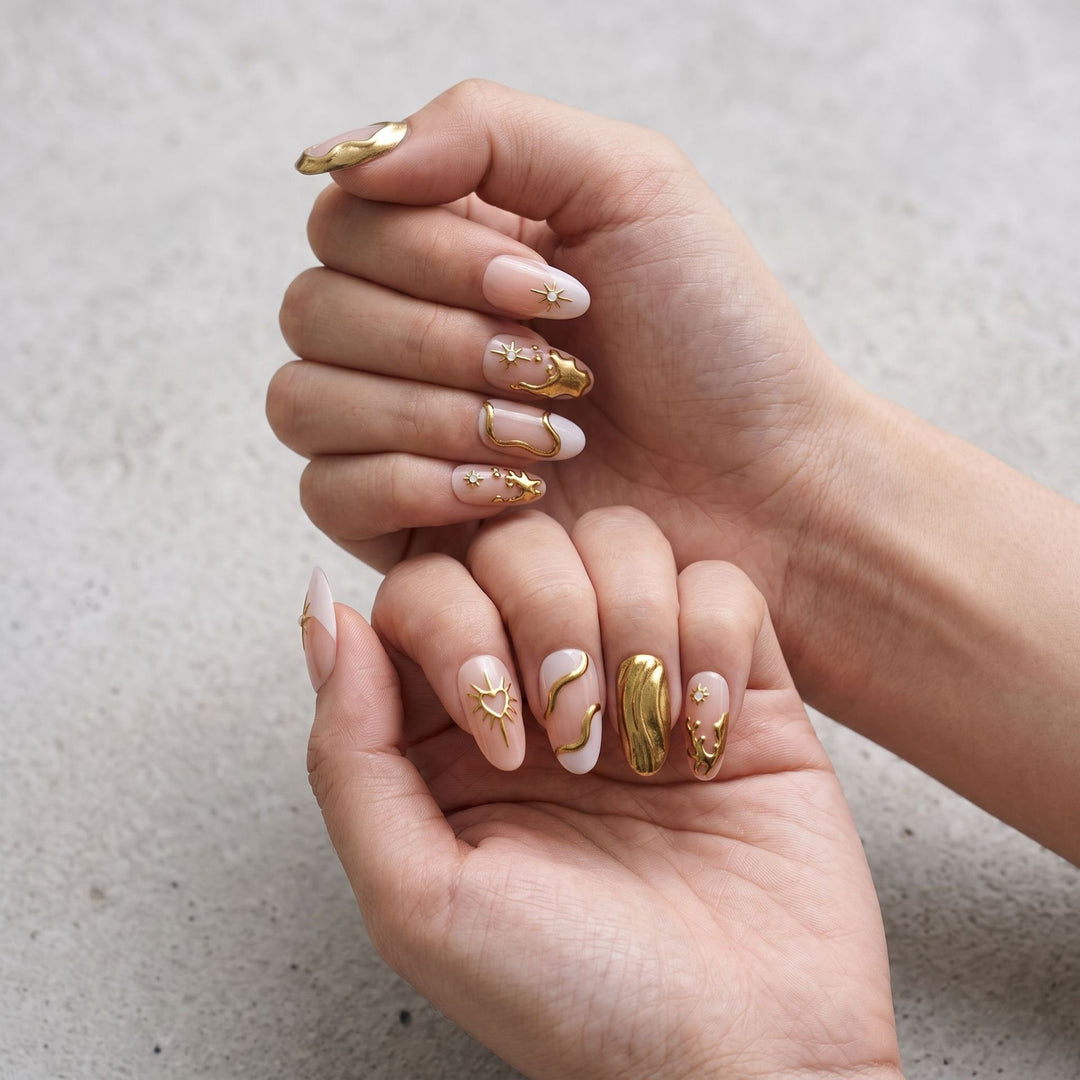 Artistic Gold Embellished Nail Art Kalsten