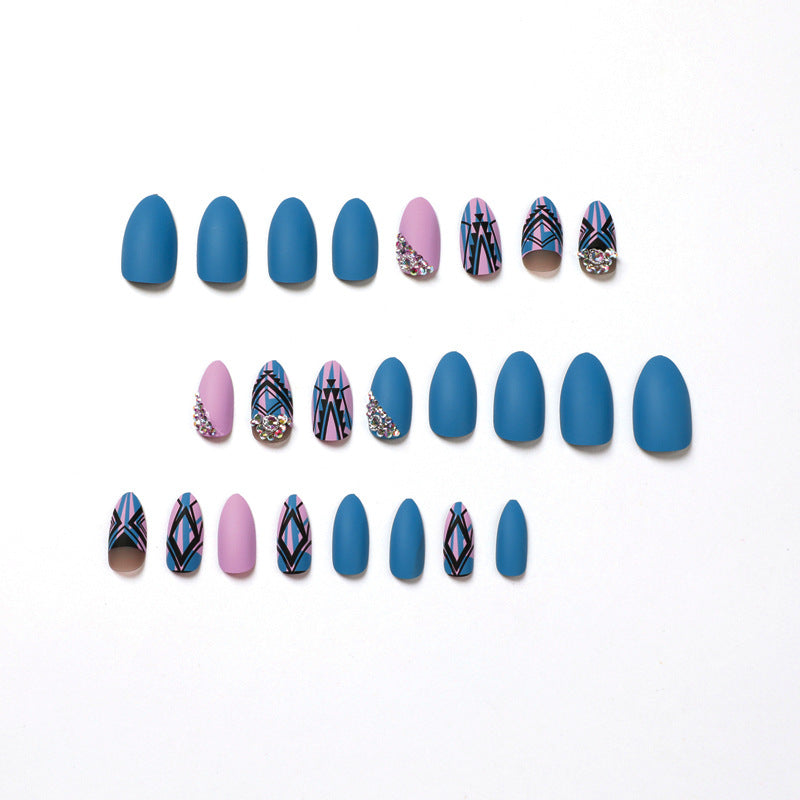 Artful stiletto nails with modern geometric designs and rhinestone embellishments Kalsten