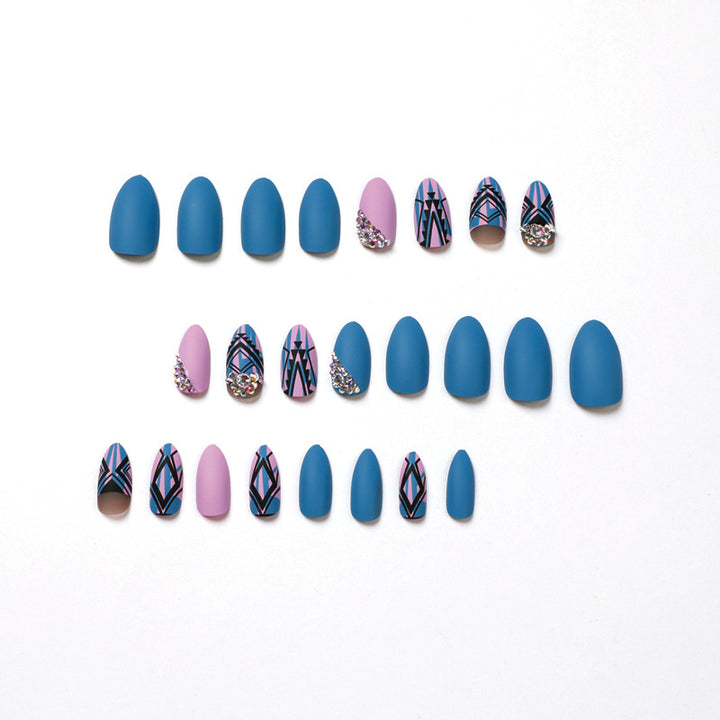 Artful stiletto nails with modern geometric designs and rhinestone embellishments Kalsten