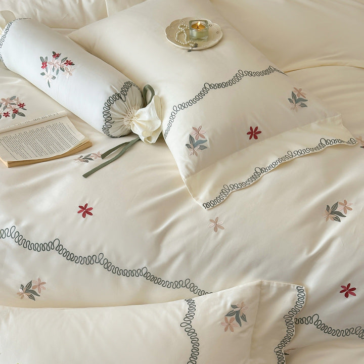 Luxurious embroidered satin bedding set with pillowcase and neck roll