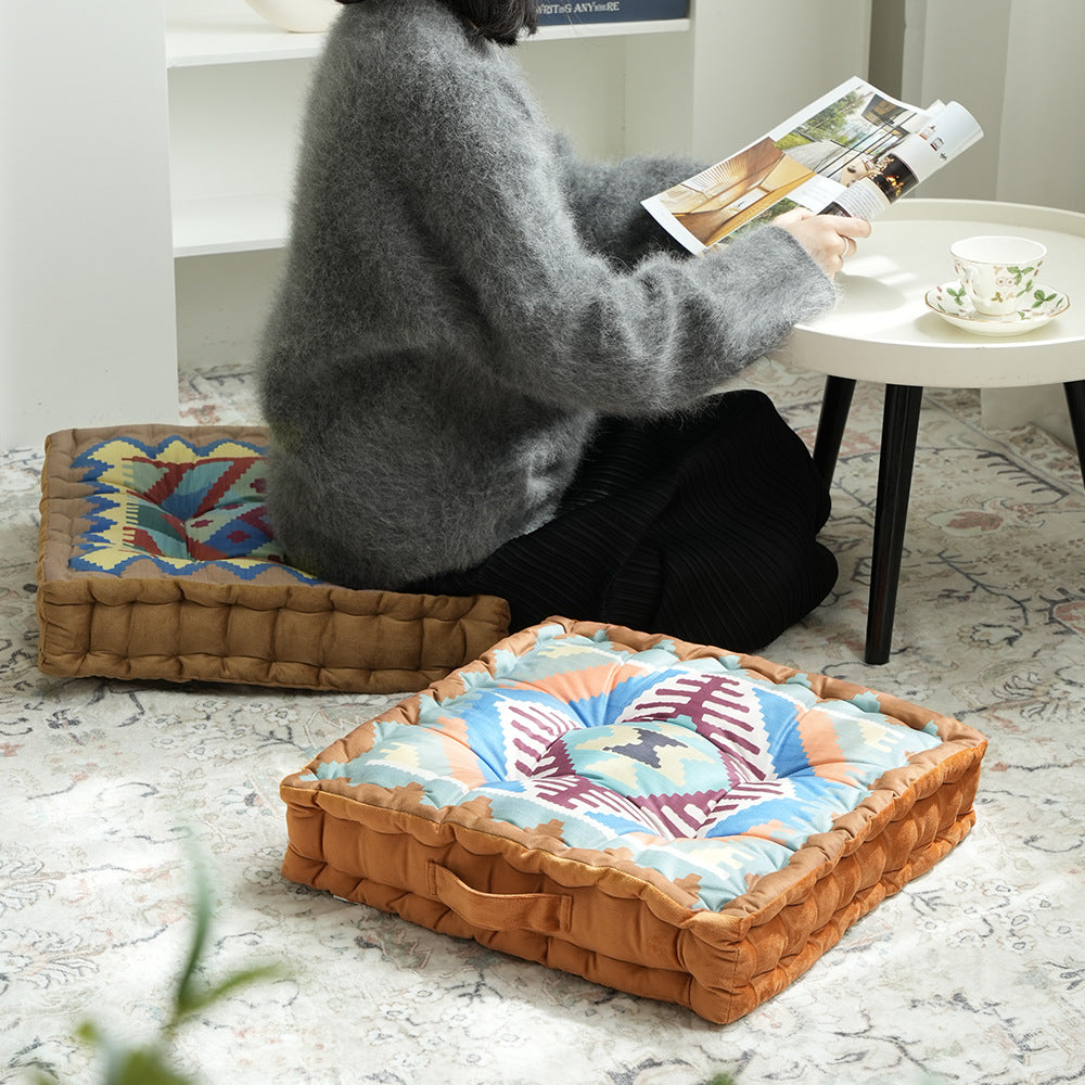 Padded seat and floor cushion with carrying handle and graphic ethno pattern Kalsten