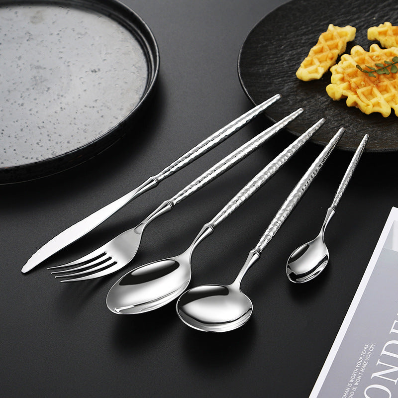 Elegant soup spoon with structured handle Kalsten