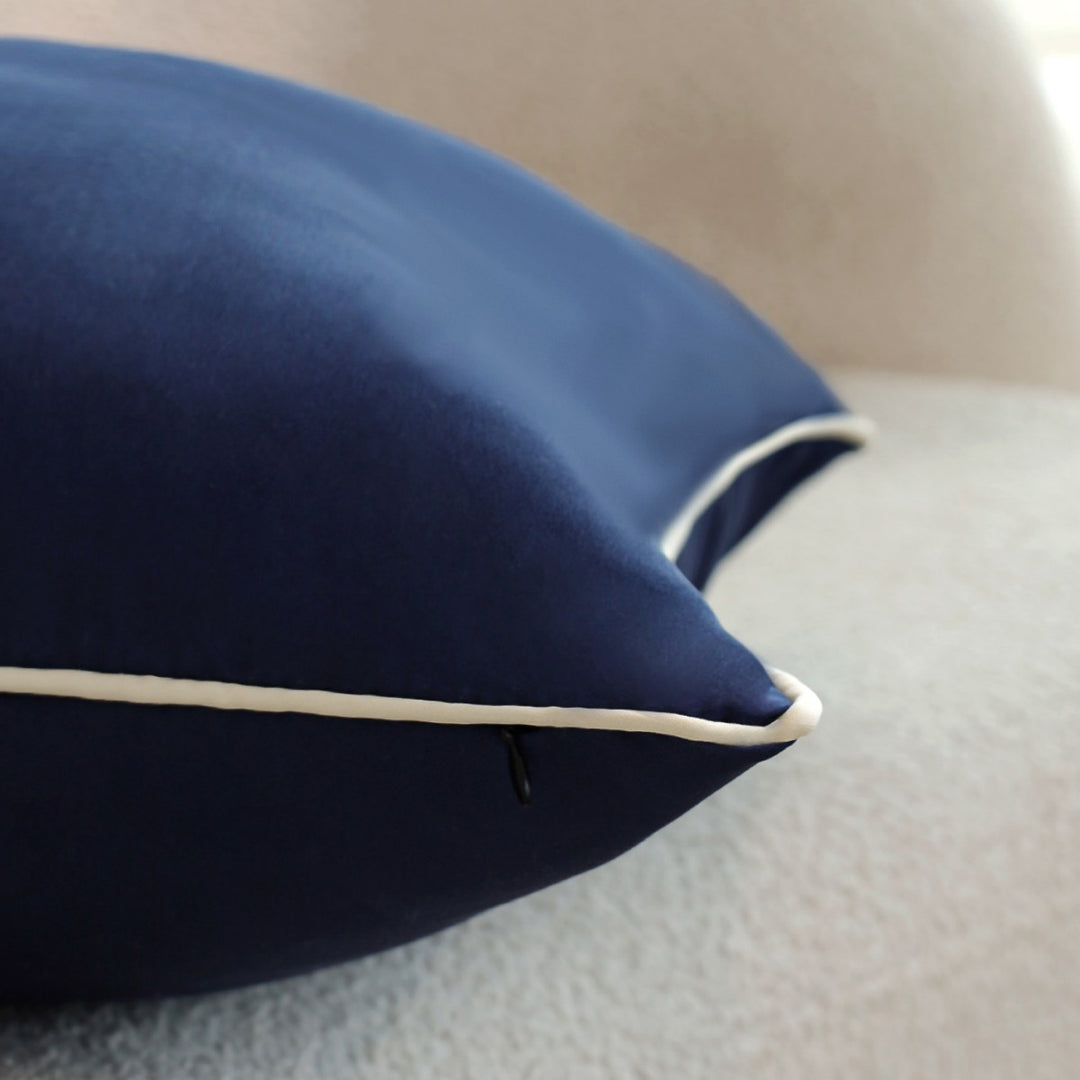 Square cushion cover with contrasting piping and microvelours surface Kalsten
