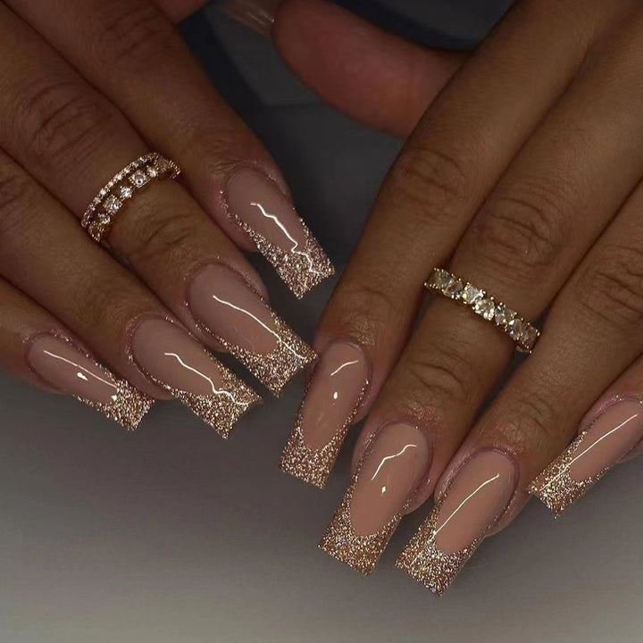 Artificial nail art with glitter and transparent design Kalsten