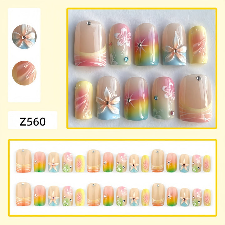 Acrylic nails with floral accents and gradient Kalsten