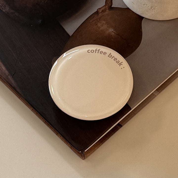 Decorative ceramic coaster with the inscription Kalsten
