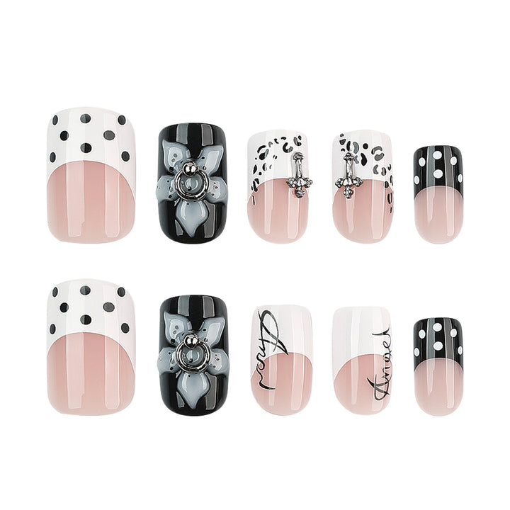 Artful nail extensions with elegant black-and-white design Kalsten
