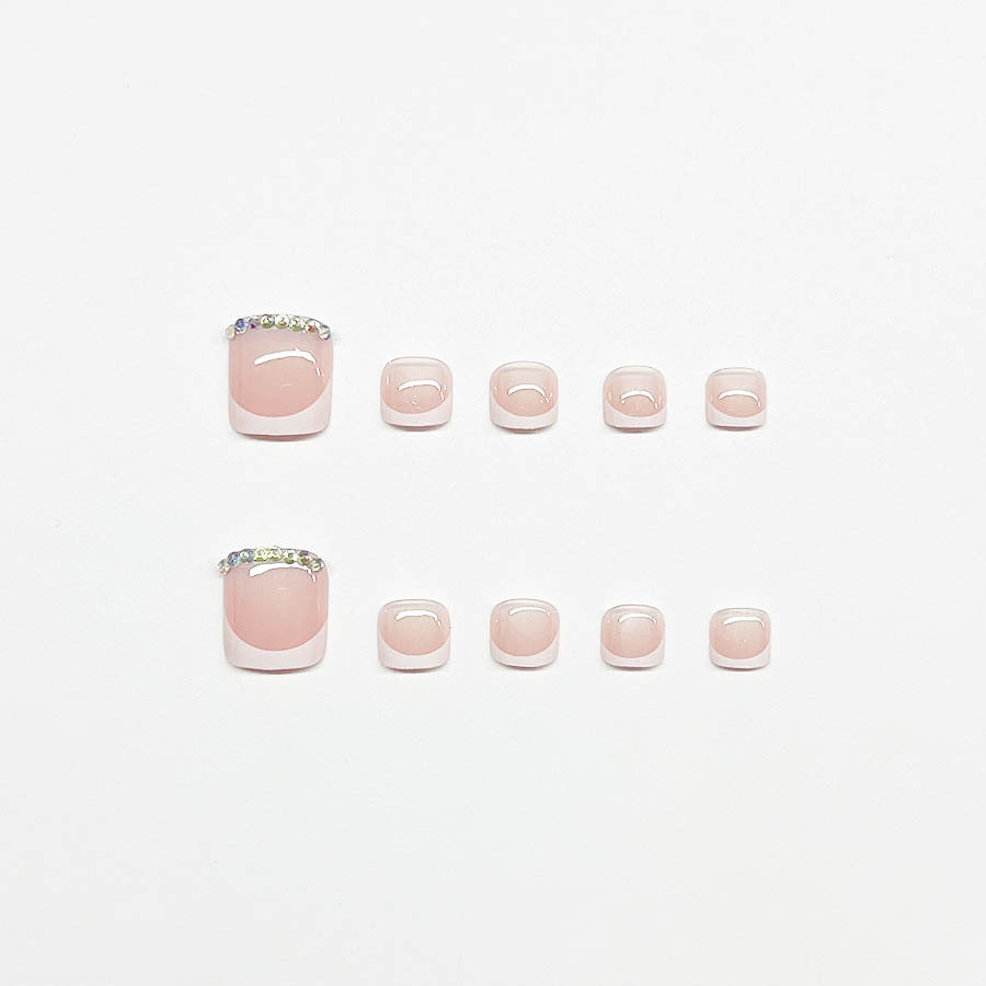 Nail art set with elegant French design and sparkling accents Kalsten