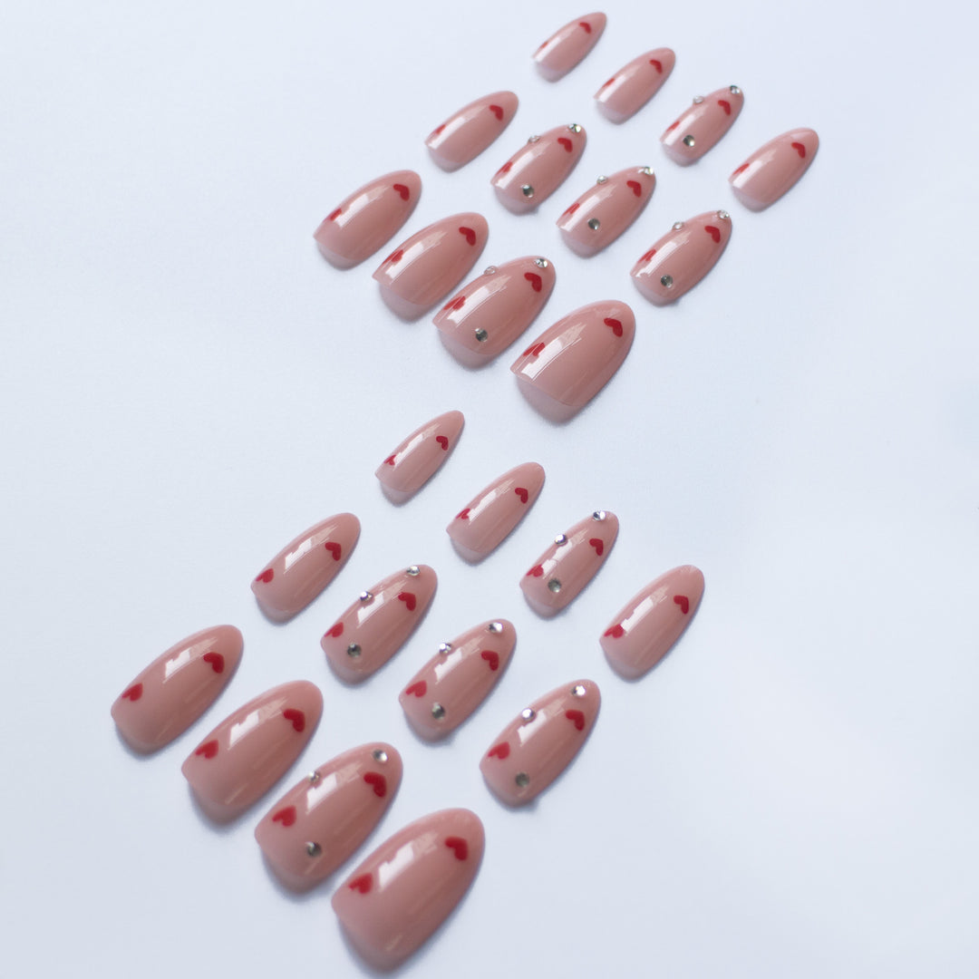 Artistic Press-On Nail Art with Heart Accents