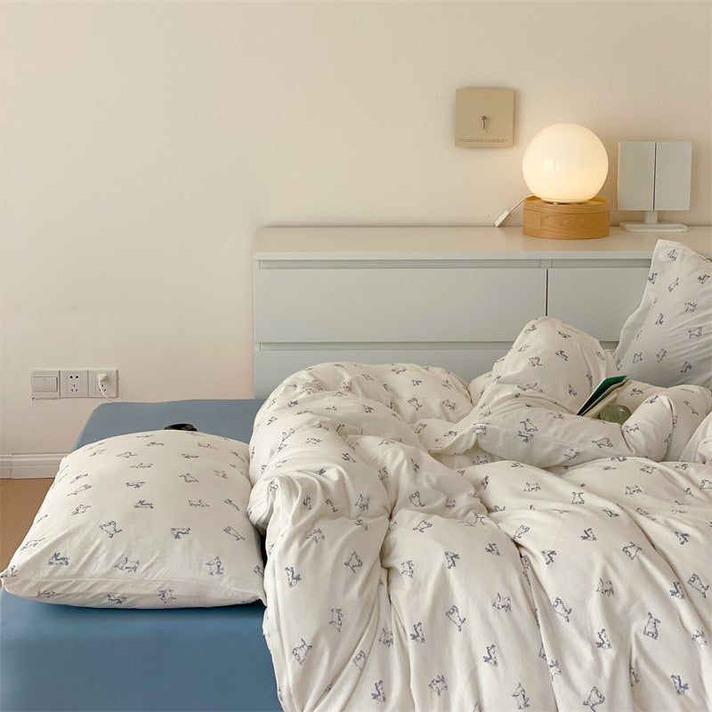 Finely woven cotton bedding set with minimalist dog sketches