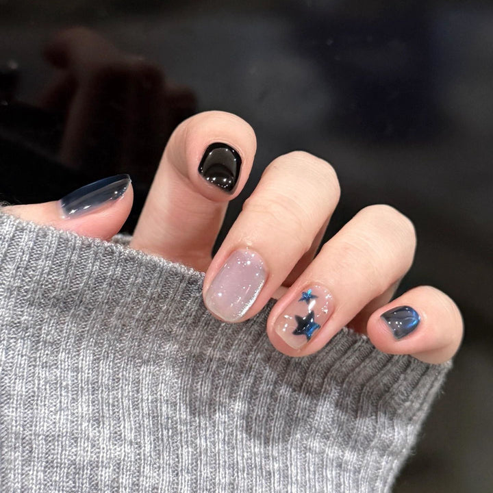 Artificial nails with elegant star design and shimmering effects Kalsten