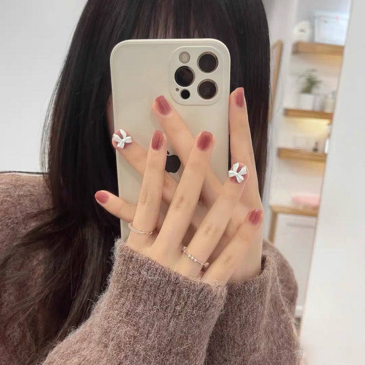 Artificial nails with elegant bow motifs Kalsten
