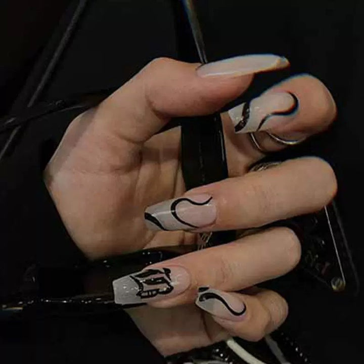 Acrylic nail set with elegant design and creative accents Kalsten