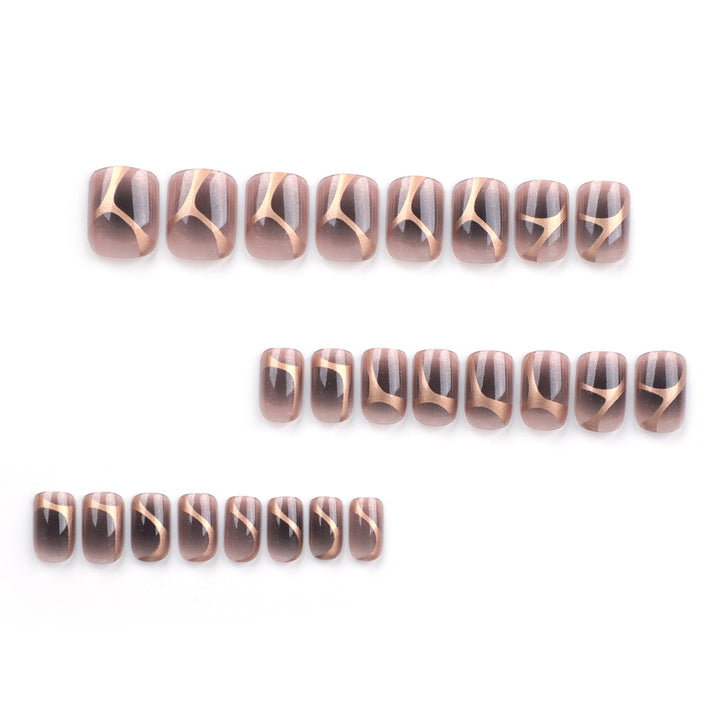 Artificial nail art with elegant metallic design and glitter accents Kalsten
